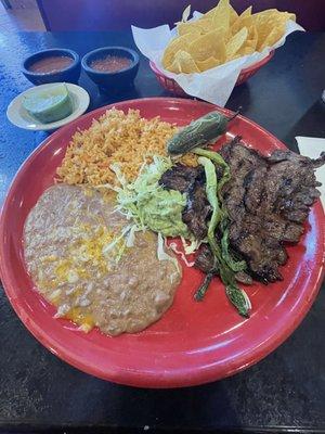 Carne asada plate, in house salsas and corn chips