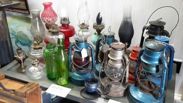 Oil lamps lanterns all shapes sizes