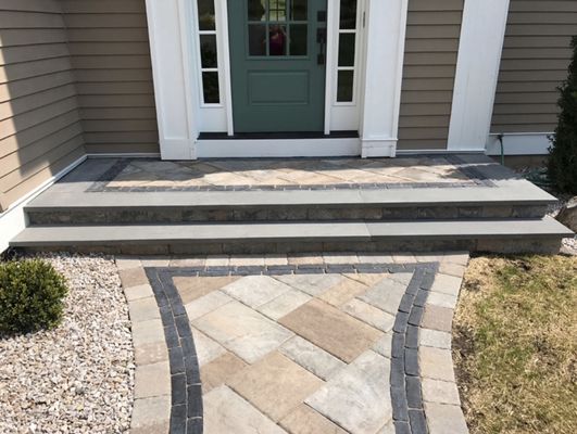 Custom landing and walkway with natural bluestone treads