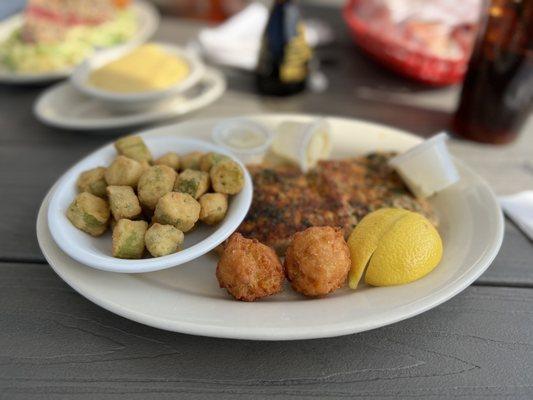 Grilled mahi mahi, fried okra , corn fritters and cheese grits