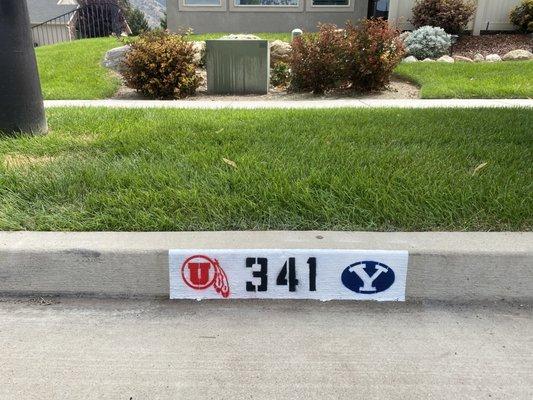 Utah and Byu on the same curb!