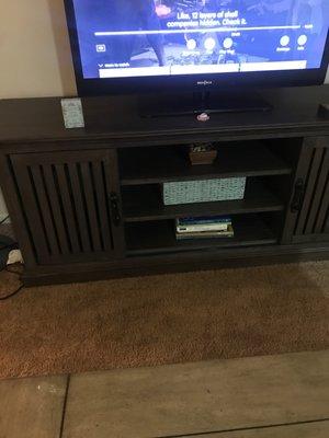 Tv stand with sliding doors