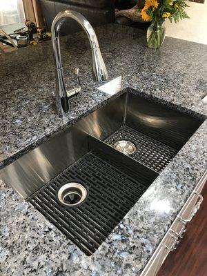 Rays mounted an under counter sink into the granite countertop they installed