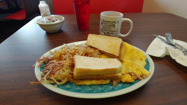 Standard breaky plate, eggs, bacon, hashbrowns, toast & coffee.