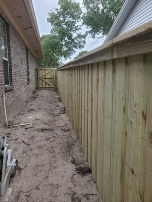 Dont mind the grass, we had excavation work done prior to the fence installation