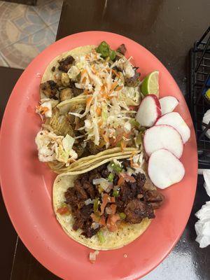 Grilled chicken, carnitas, and carne asada tacos