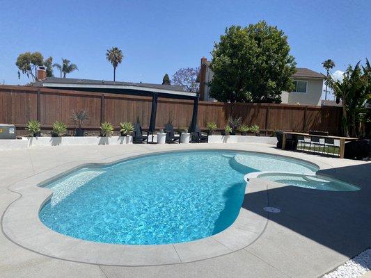 We modernized our kidney shape pool and removed an old diving board.