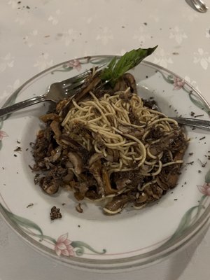 Housemade pasta with porcini mushrooms and topped with truffle