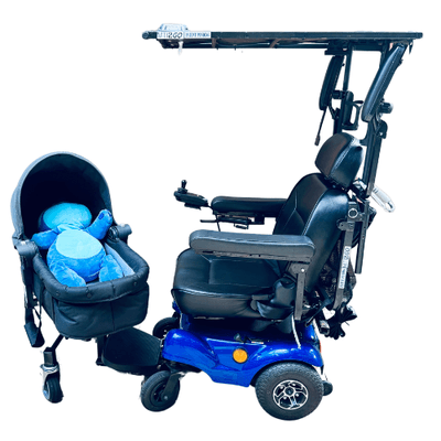 Bassinet attachment for electric wheelchair