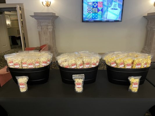 individual bags of white cheddar, movie theater butter, and kettle corn