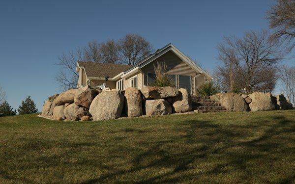 Boulder wall and landscaping