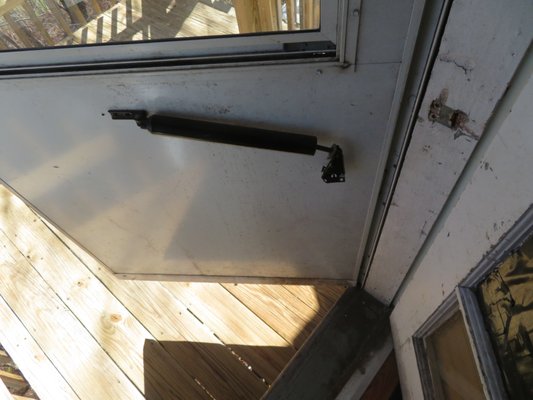 A storm door piston is broken.