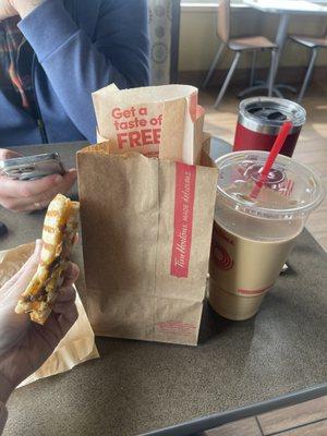 Our order: iced coffee, two donuts in the bag, and the steak & cheddar panini.