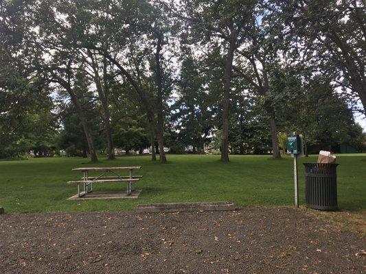 4 acre park, lawn and picnic tables.