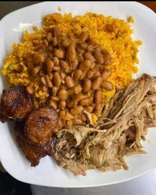 Pernil(Rost pork ) , yellow rices, beans , maduros