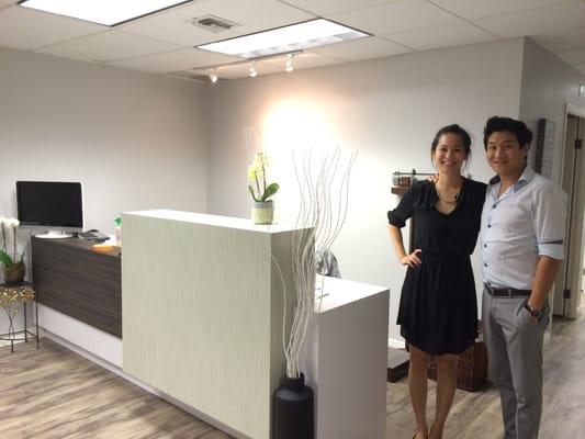 Acupuncturist Elisabeth Choi and Dr. Kelvin Yoo at front desk