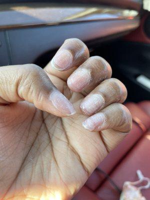 Nails messed up with residue, tips still on nails. No nail prep from Mei