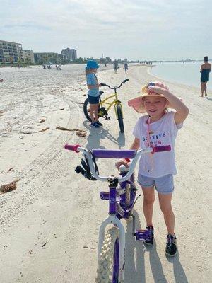 Kids on beach with bikes