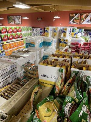 Dirty, disgusting, dust old shelves with random unorganized products laying everywhere