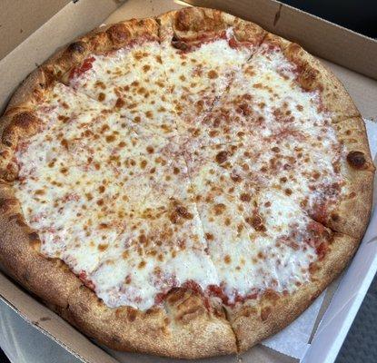 Plain Cheese Pizza - heavy on the cheese if that's your thing. Soft doughy crust.