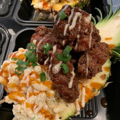 Famous Fineapple Bowl- pineapple fried rice, Kiso's fried chicken, mac salad all inside of a pineapple bowl