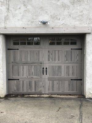 wood grain garage with decorative hardware