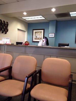 Several Computers at the front desk to help check you in quickly.