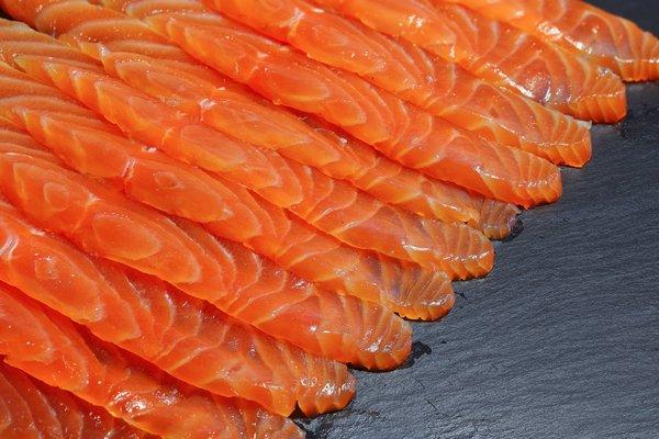 Try our Smoked Salmon Strips.  in various flavors.