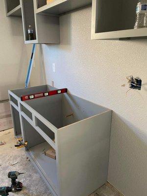 Installing kitchen cabinets