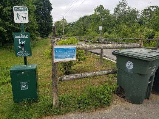 Pick up after your pup. Trash barrels located at this lot.