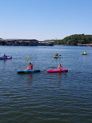 A group of kayakers enjoying Lake of the Ozarks at Adventure Boat Rentals - North Lake Ozark