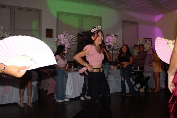 Quinceañera having a blast on her special day