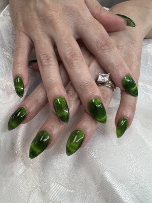 Acrylic nails with gel polish, Cat's Eye Green.