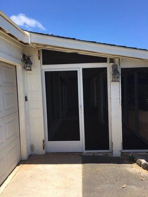 Lanai swing door with pet screen.