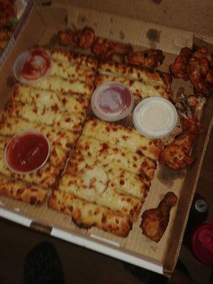 Casey's pizza, wingsand breadsticks.