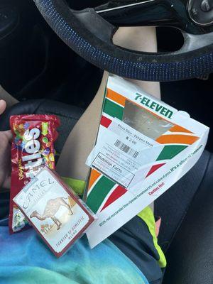 Skittles, cigarettes, and a piece of pizza