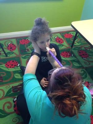 Improving oral motor and motor planning in speech therapy with a KDA cutie