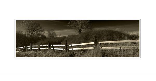 a detail image of the ranch land in our area, showing new boards applied to ranch fencing