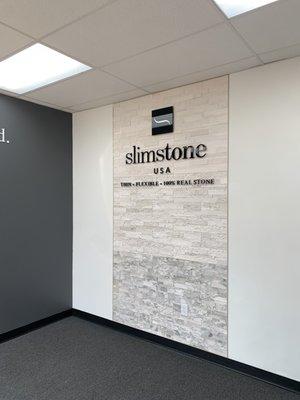 Showroom entry wall featuring our LedgerStone Collection in Glacier, Aspen Rock & Onyx White.