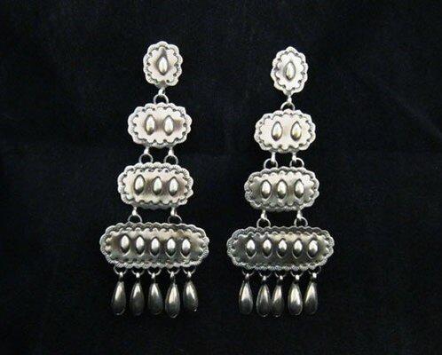 Silver chandelier earrings.