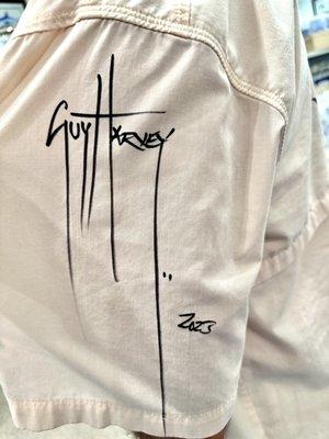 Guy Harvey signed my husband's Guy Harvey shirt on the sleeve.