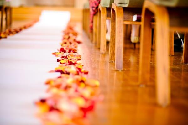 Cathy's team sprinkled petals along my aisle runner. They used a lot of petals! 7/7/12 wedding