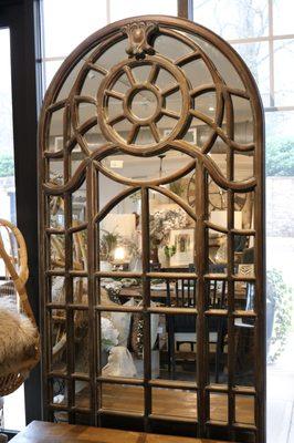 Just imagine how this dramatic mirror--inspired by cathedral windows--would bring light and life into your space. ⁣