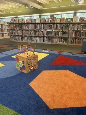 Carpeted cushioned kids area