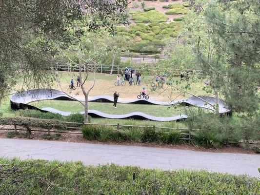 Pump track! Harder than it looks, I did on my skateboard and fell off once