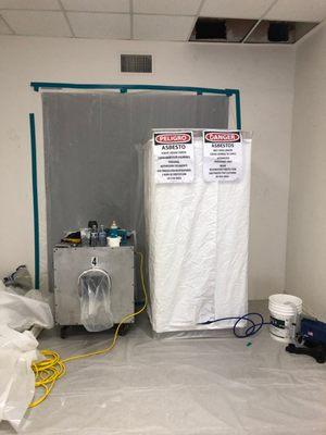 An Example of a Asbestos Containment. These are for public health safety precautions. Do not enter these zones