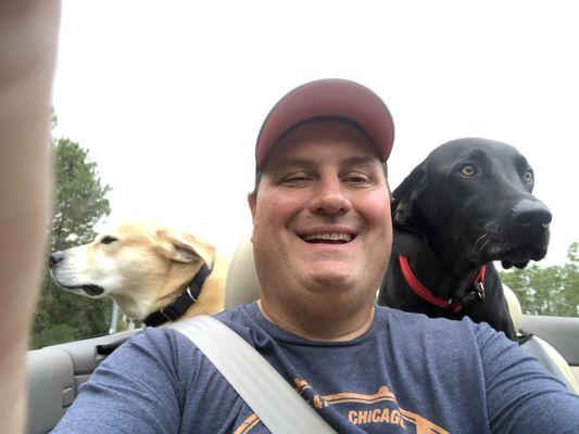 nothing like the top down with man's best friends.....