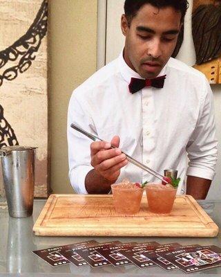 PartyTap bartender Jon putting the final touches on a raspberry mojito.