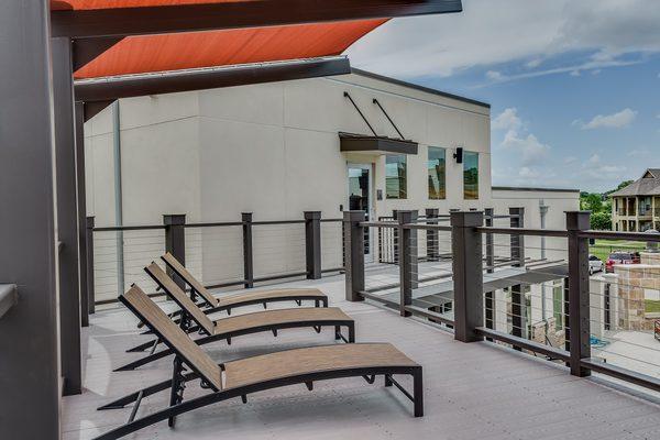 Second floor sun deck overlooking the pool