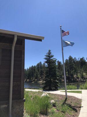 The main walkway to the lake and the restaurant, boasting a beautiful American flag.